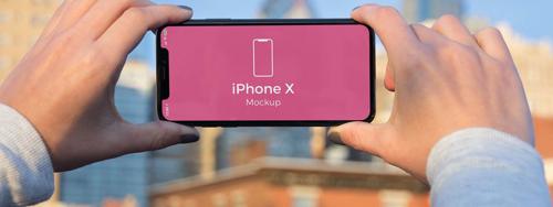 12 Beautiful iPhone In Hand Mockups