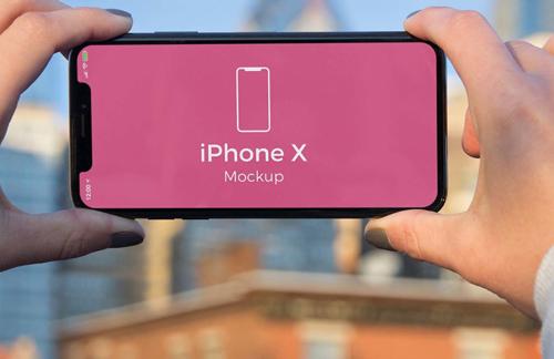 12 Beautiful iPhone In Hand Mockups